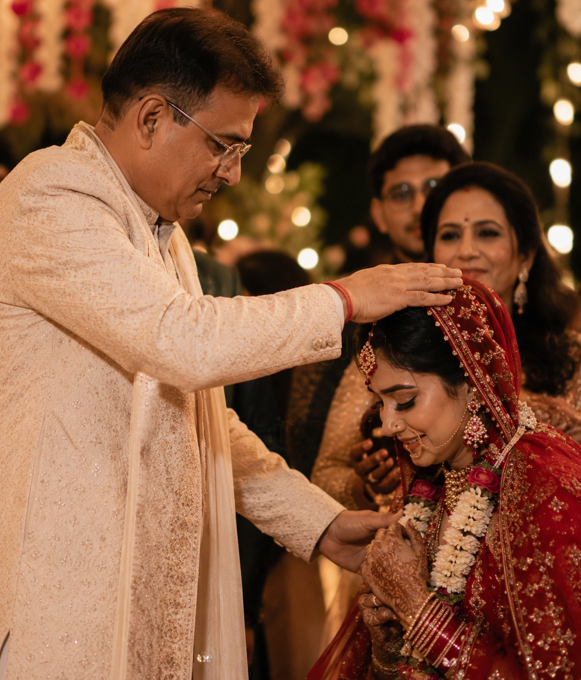 Heartfelt father blessing his daughter before the wedding ceremony, capturing an emotional family moment during a luxury Indian destination wedding celebration.