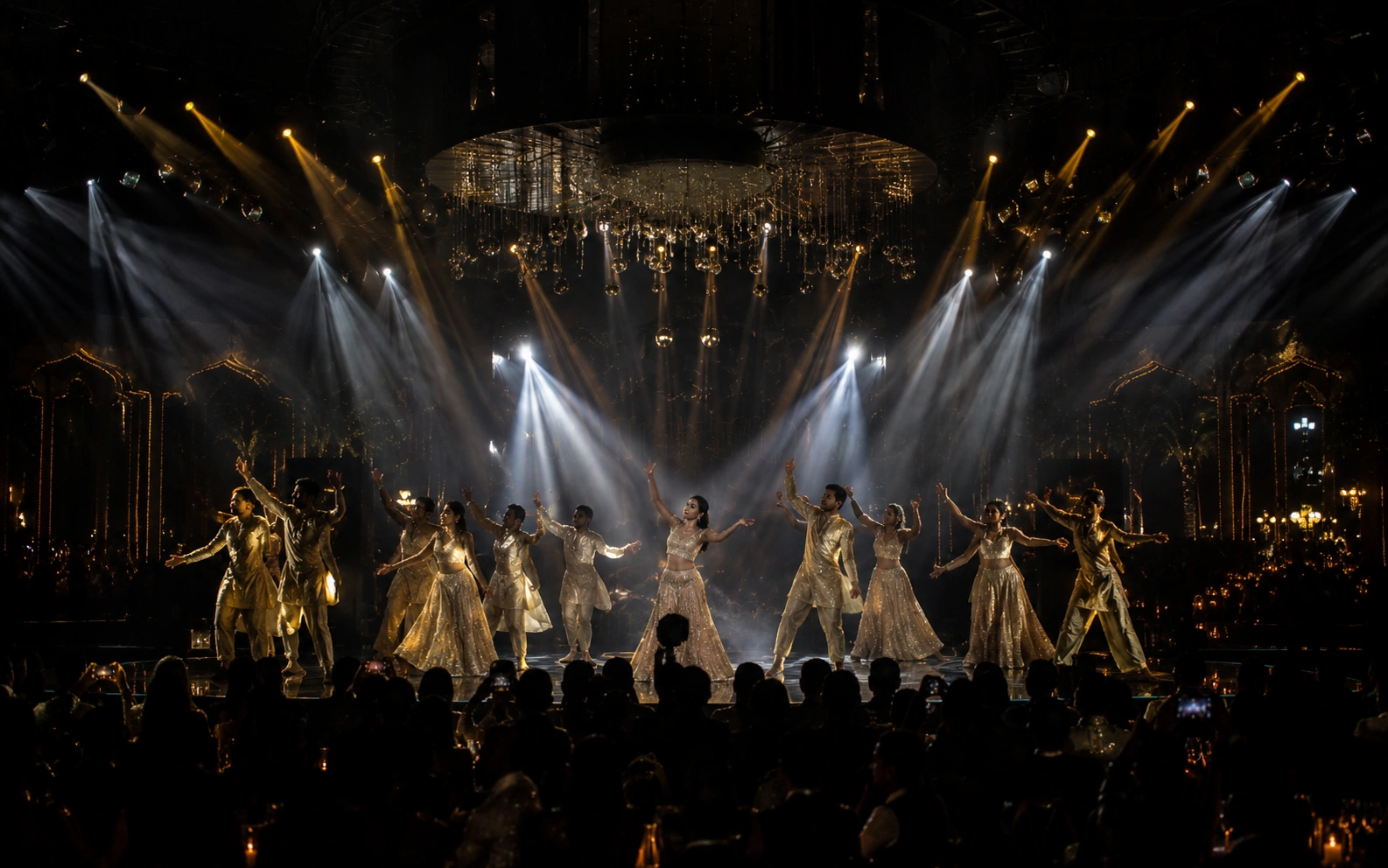 Exclusive private celebrity concert performance staged within a royal Udaipur palace setting, featuring intimate stage design, dramatic spotlight ambiance, and luxury event production by Lotus Grandeure.