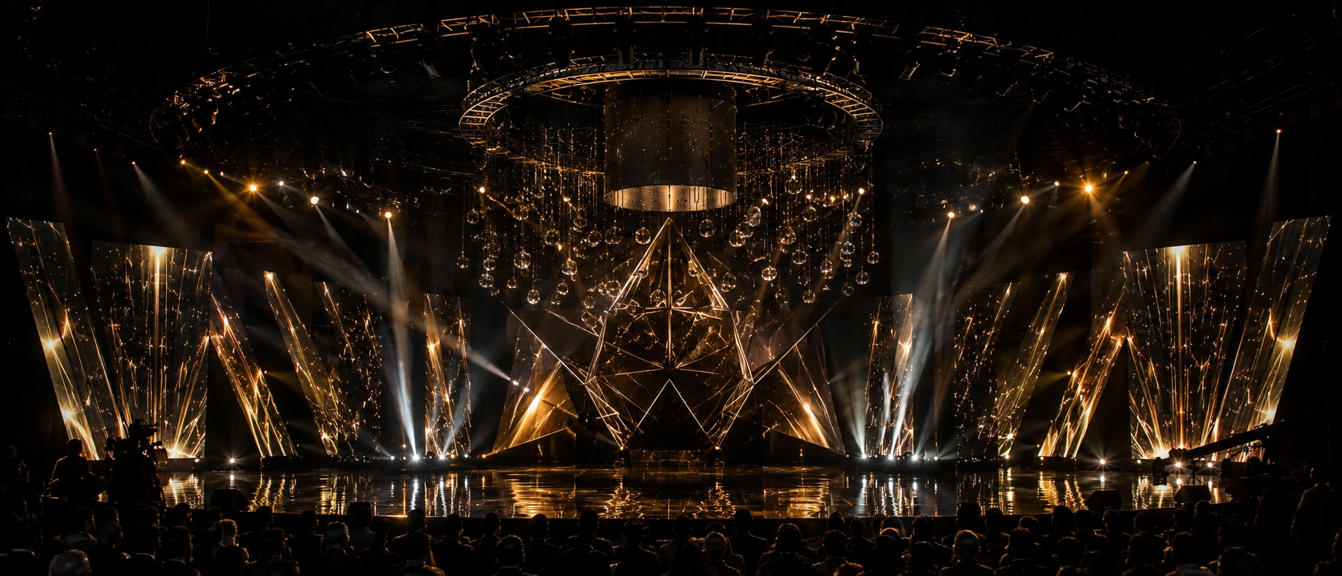 Dramatic theatrical stage production reveal by Lotus Grandeure featuring grand velvet curtains, cinematic spotlight design, and engineered luxury event architecture crafted for unforgettable Indian celebrations.